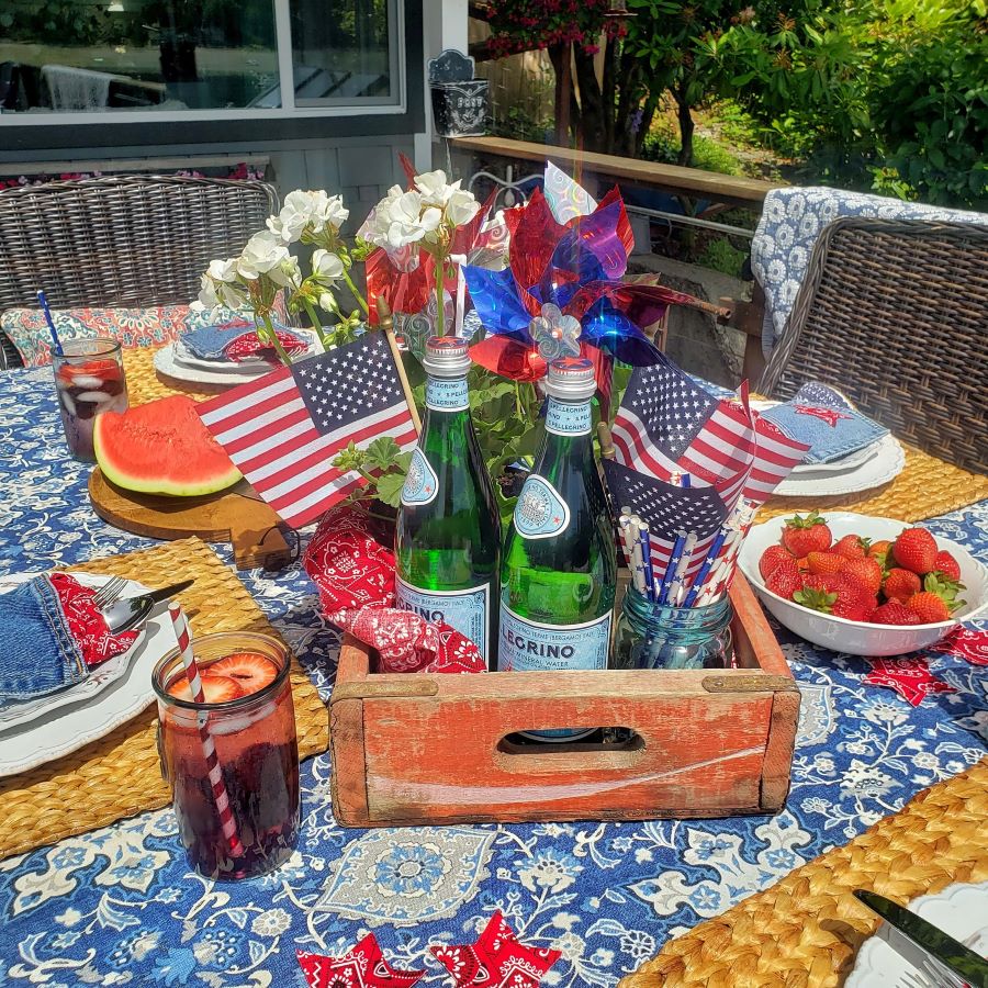 a outdoor dining table with patriotic decor