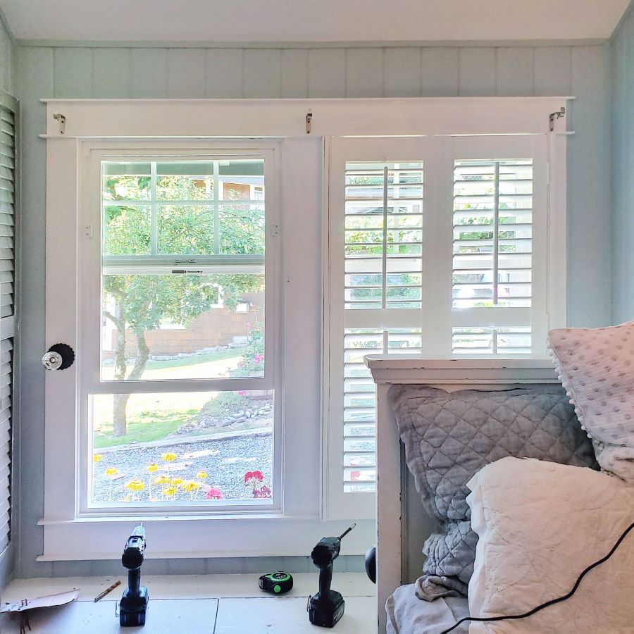 installing signature wood plantation shutters by Blinds Chalet