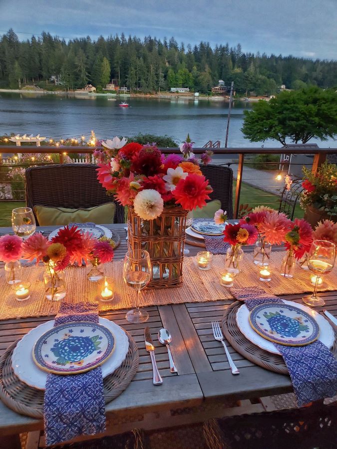 Late summer evening with flowers and candlelight overlooking the Puget Sound.