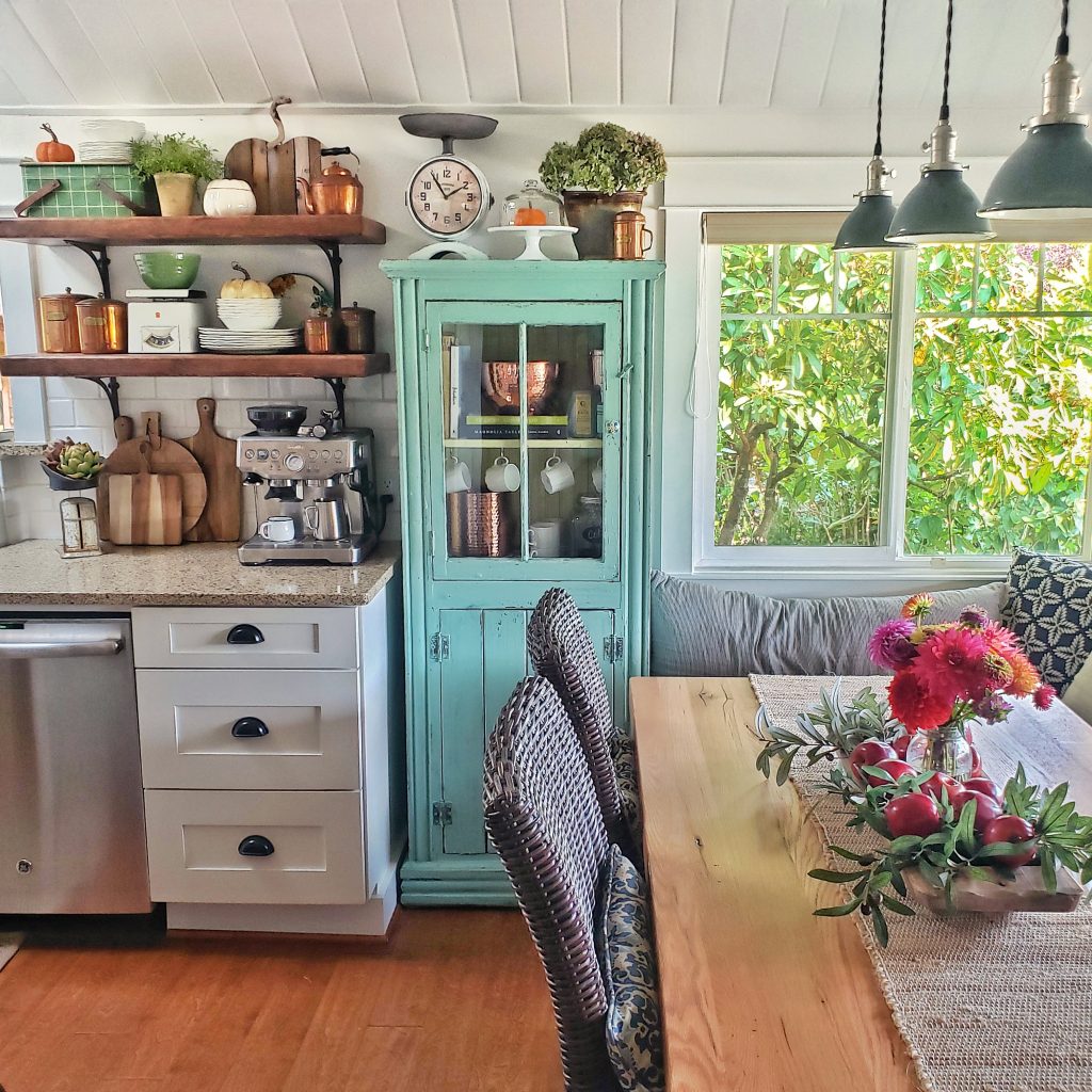 cozy fall kitchen  with turquoise cabinet