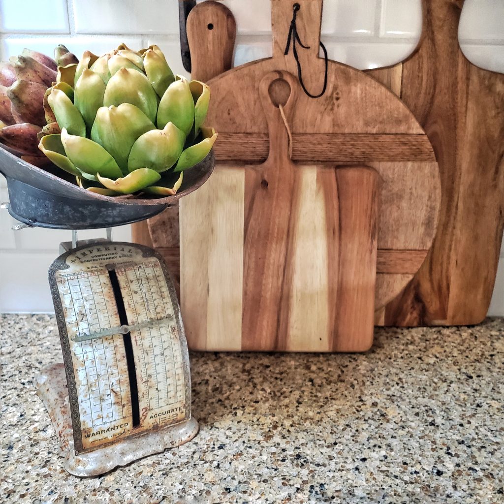 bread boards and vintage scale with artichokes