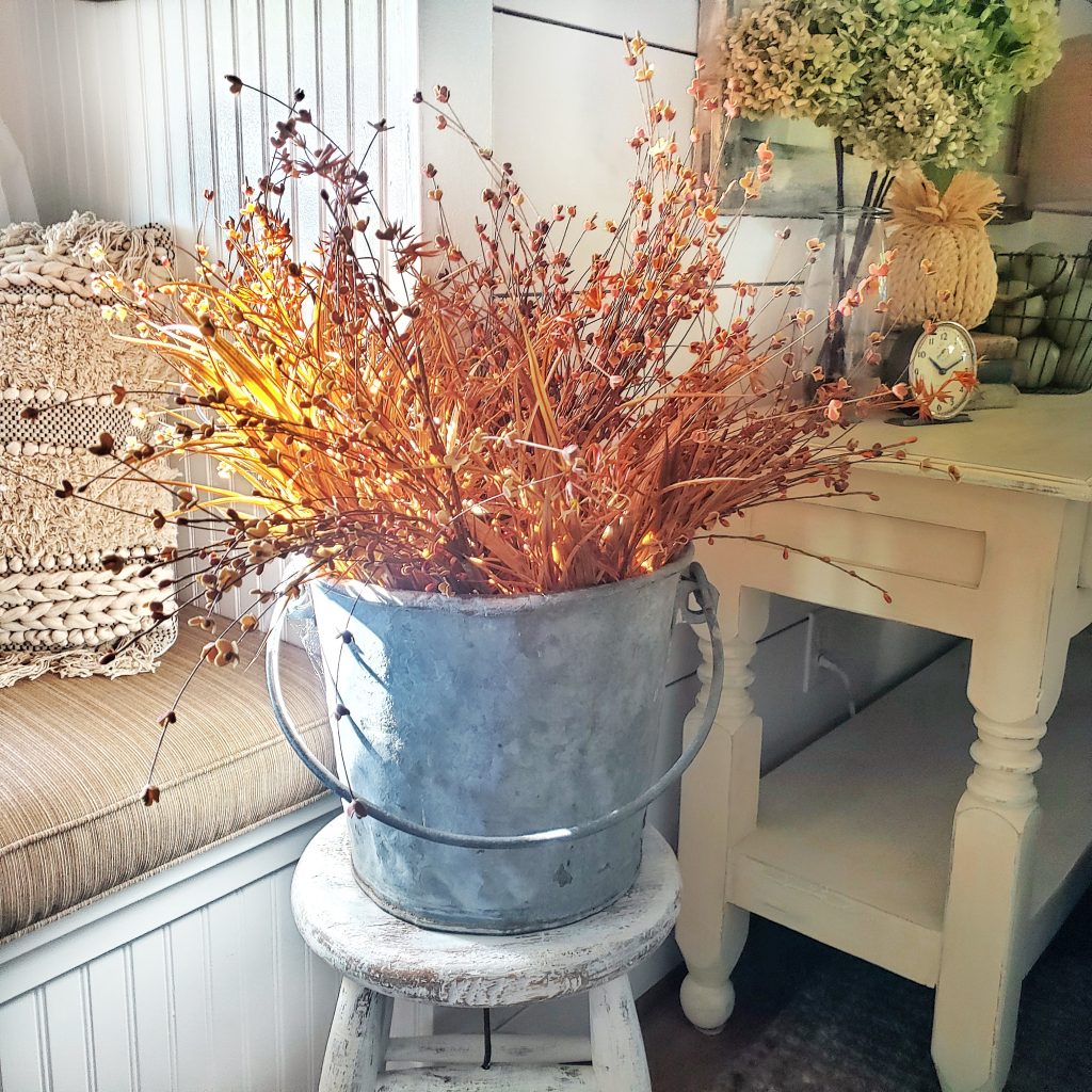 galvanized bucket with fall grasses