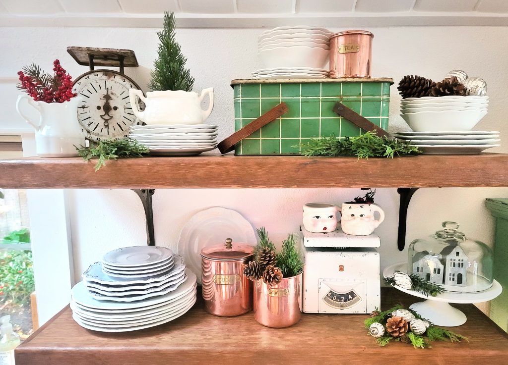 budget Christmas decorating: vintage copper, ironstone and holiday decor on open shelves