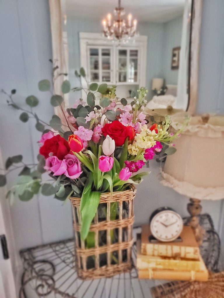 Tulips, stock, eucalyptus and roses make a great statement together. 