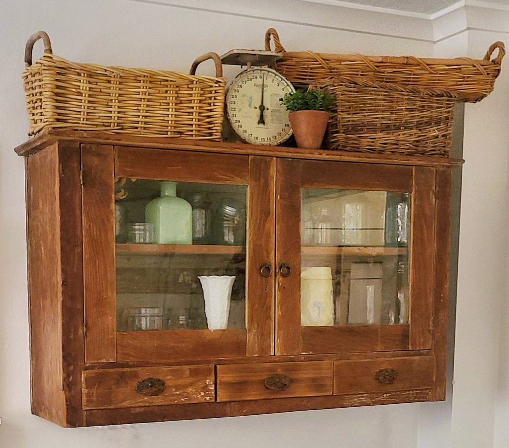 thrifting vintage find wood cabinet