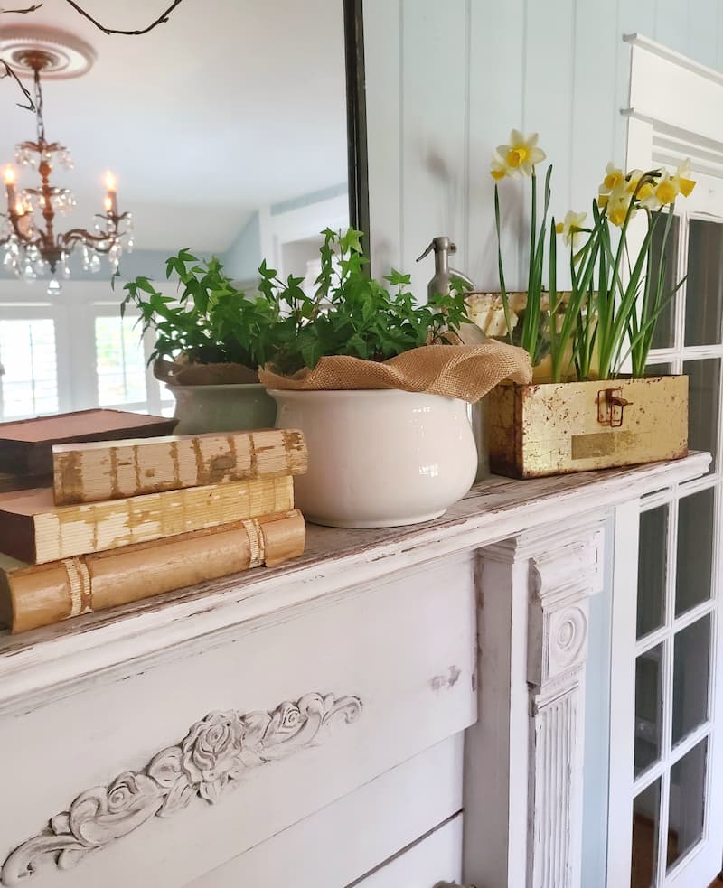 spring décor on a fireplace mantel