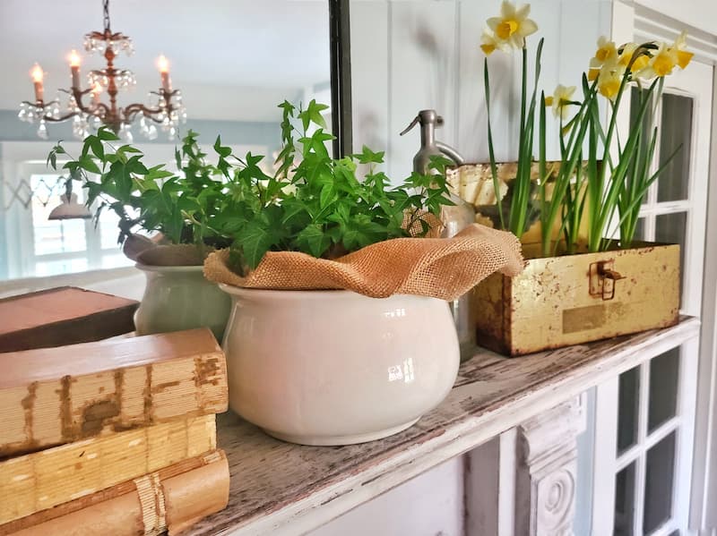 spring décor on a fireplace mantel