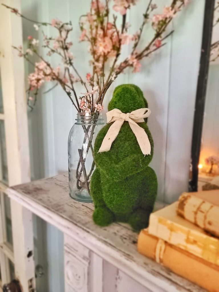 moss bunny and spring blossoms