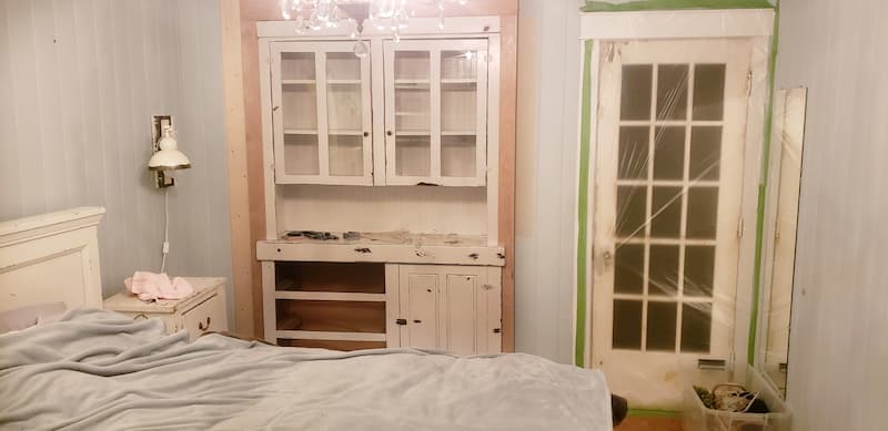 100-year-old cabinet built-in being put in