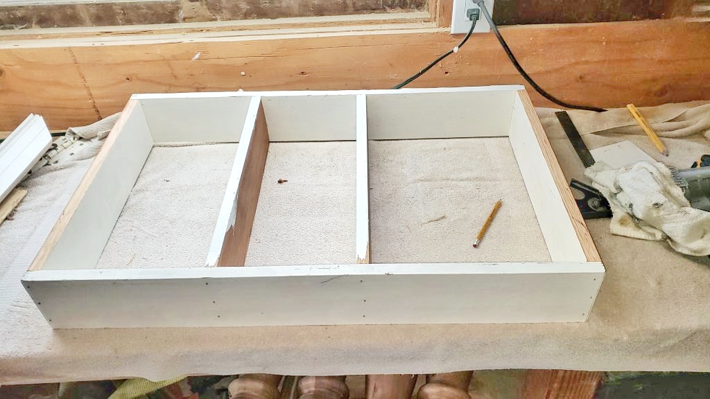 creating a repurposed vintage window cabinet