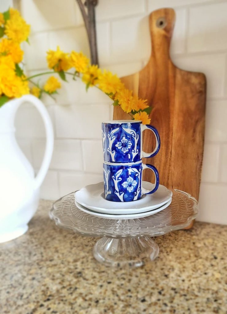I decided to display my blue and white espresso cups rather than my white ones because I love how they look with the bright yellow flowers.