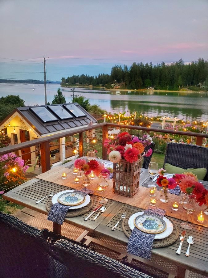 Outdoor summer tablescape overlooking the water