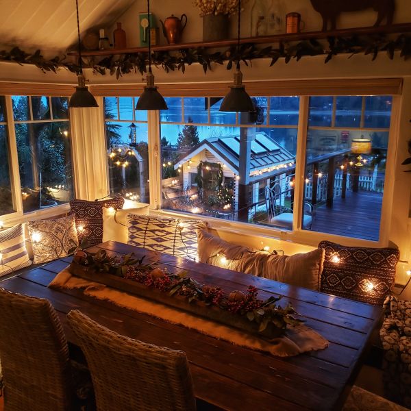 Christmas cottage style kitchen window seat and twinkle lights