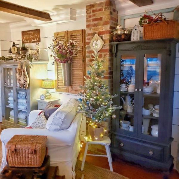 Christmas cottage style living room with mini Christmas tree