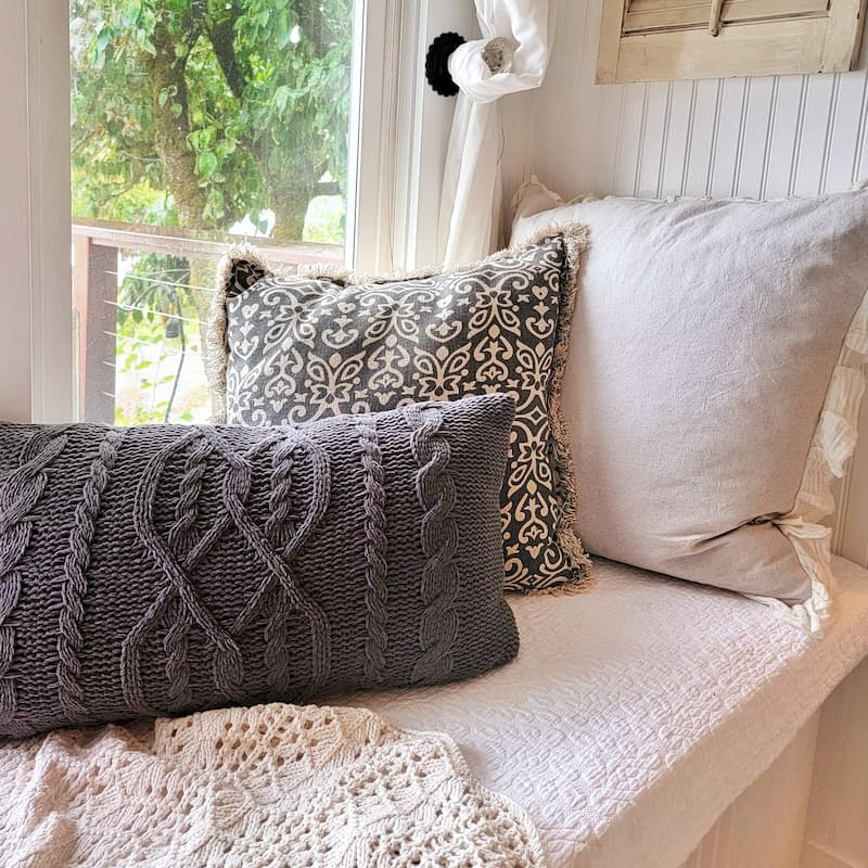 Transition Your Home Decor From Summer To Fall: gray and cream pillows and throws