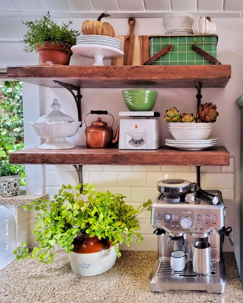 open shelving with fall décor