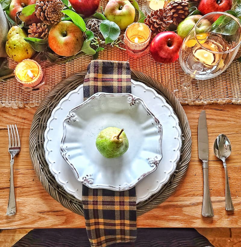 place setting fall tablescape with outdoor elements