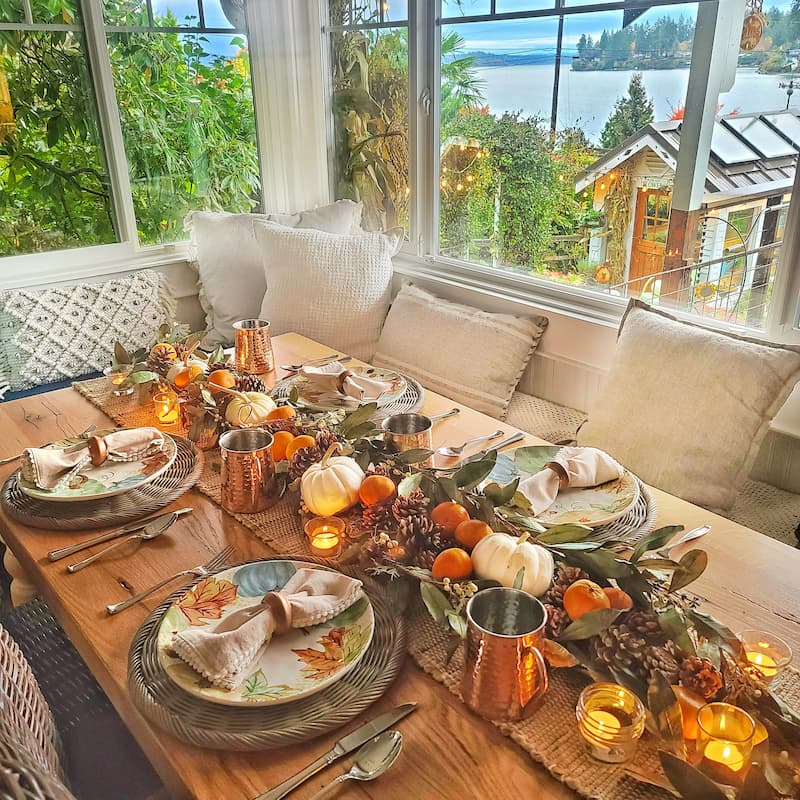 fall tablescape with natural elements  with clementines and white pumpkins