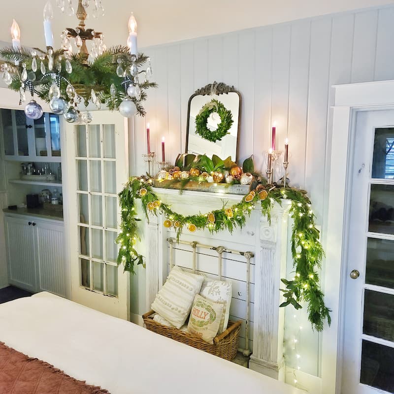 Christmas bedroom mantel with garland