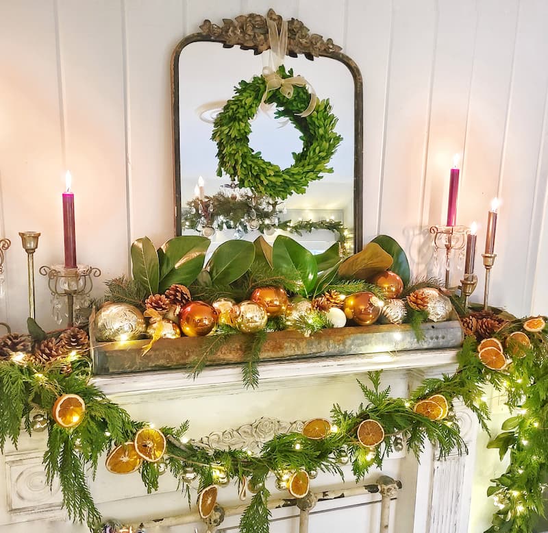 planning ahead for Christmas decor - greenery garland and dried oranges