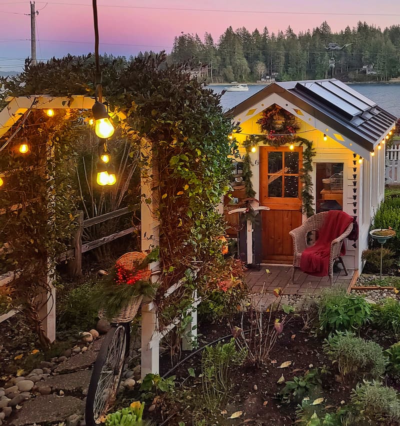 Christmas greenhouse at sunset and arbor