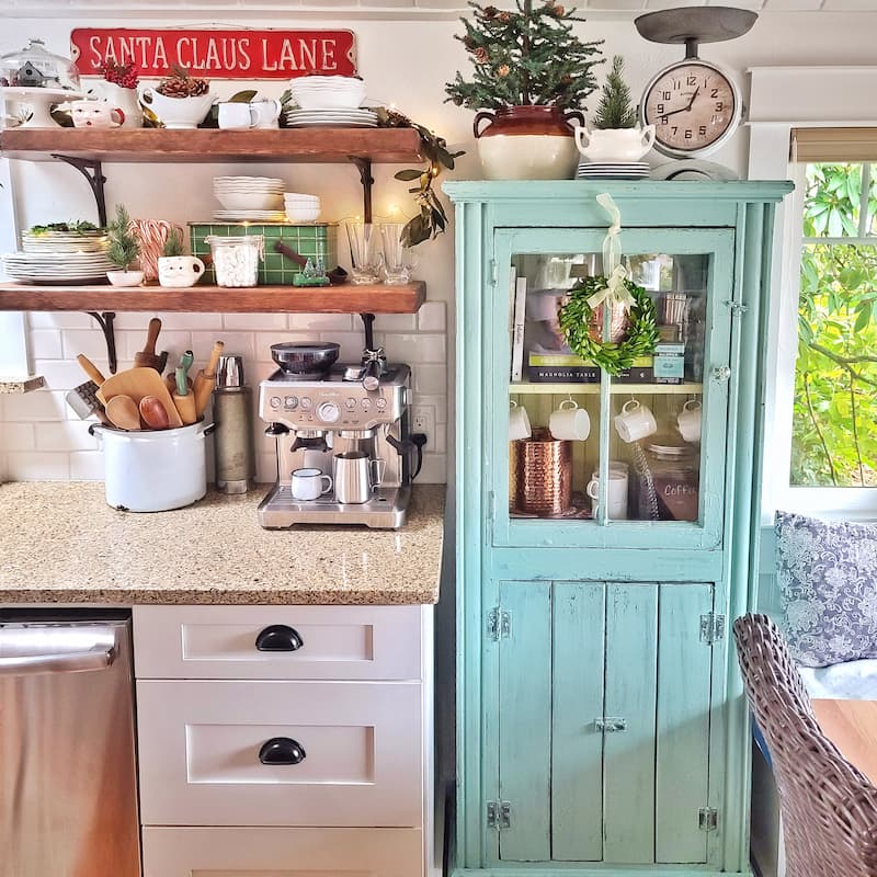 Christmas kitchen with open shelving and cabinet
