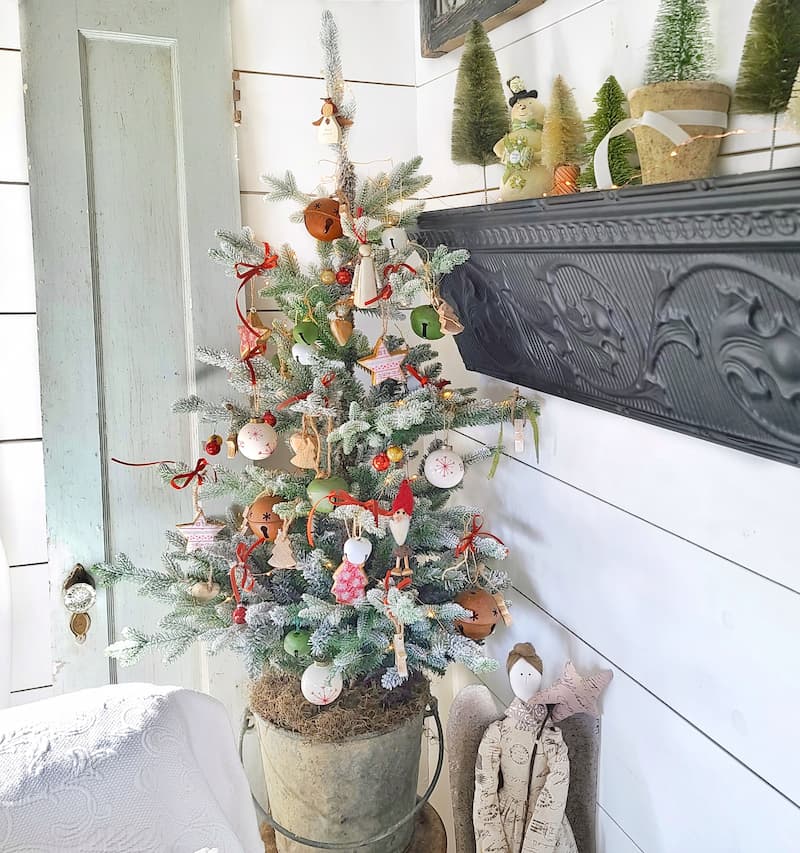 Christmas tree with vintage galvanized bucket container