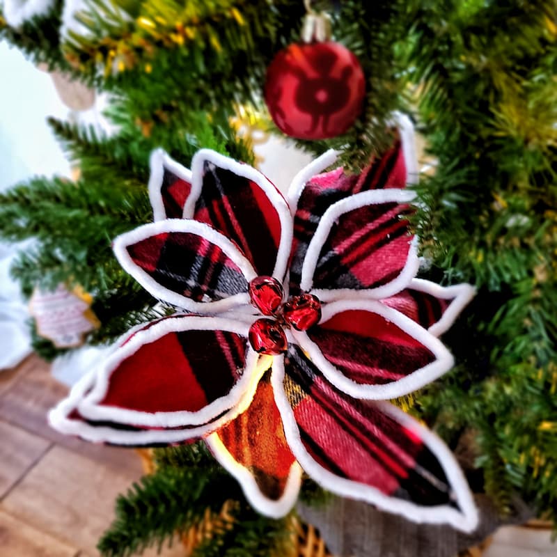 red and black plaid poinsettia decorations for Christmas