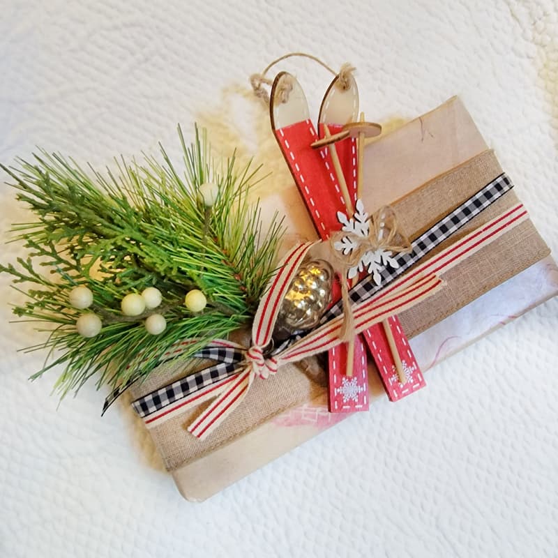 holiday gift wrap with  red skis