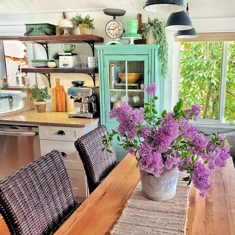 lilac on farm table in kitchen
