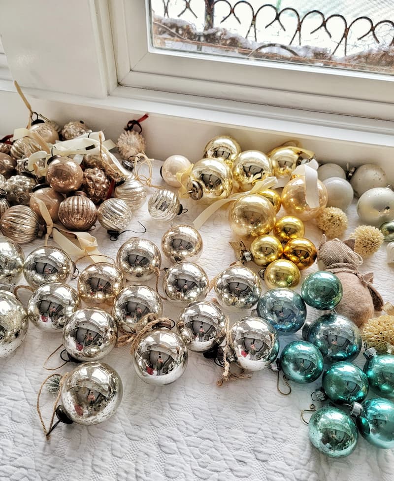 planning Christmas in July: silver, gold, and aqua ornaments