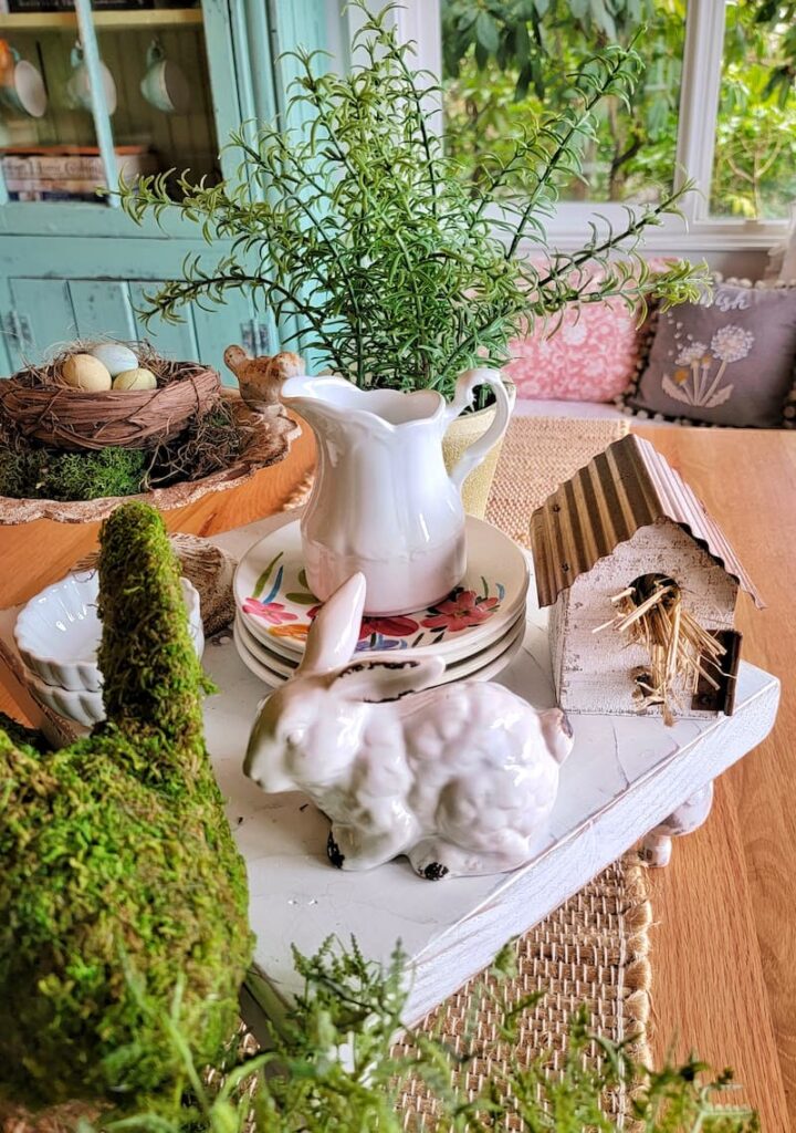 white ceramic bunny birdhouse and white pitcher