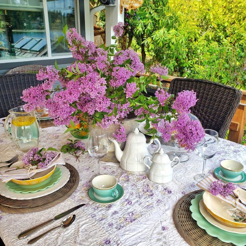 spring thrift store finds: lilac tablescape with vintage quilt and ironstone tea set