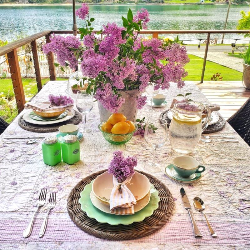 spring tablescape with a lilac centerpiece