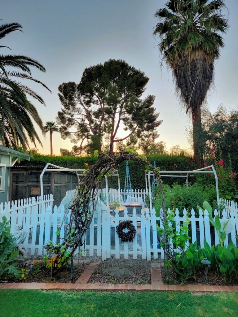 white picket fence garden
