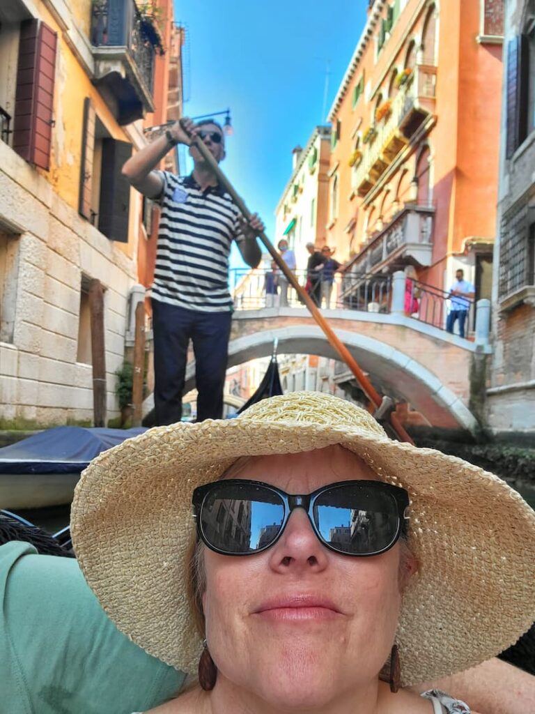 riding on the gondolas in Venice, Italy - trip to Italy and Greece