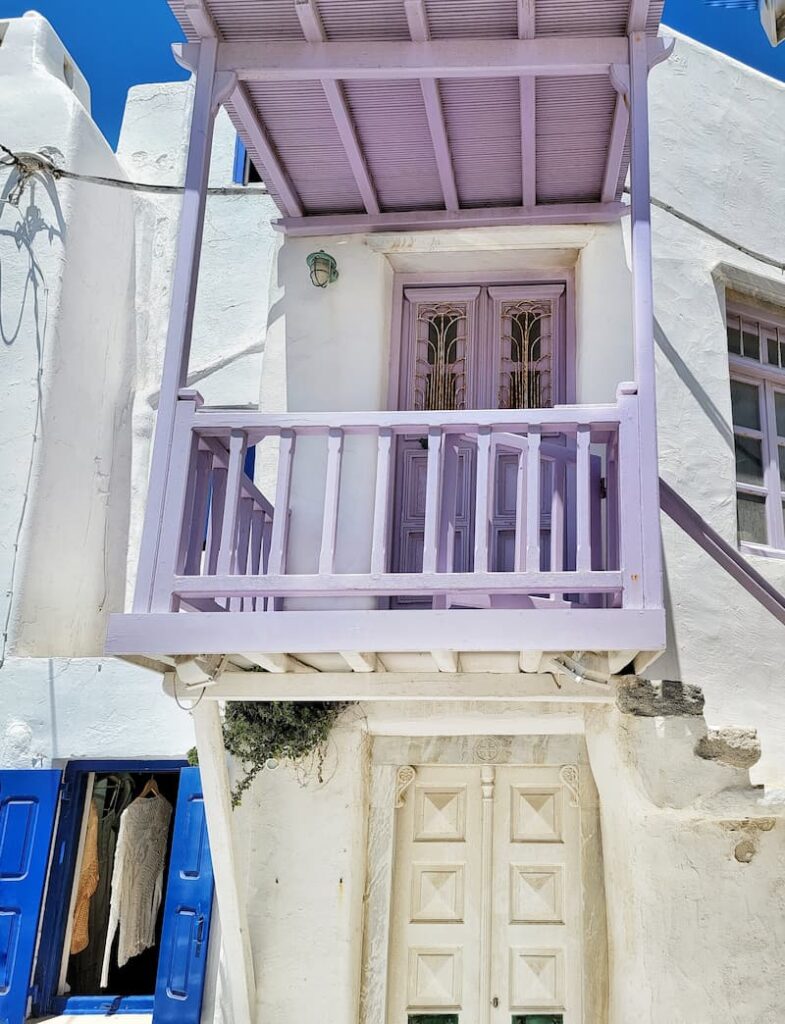 purple door and balcony in Greece