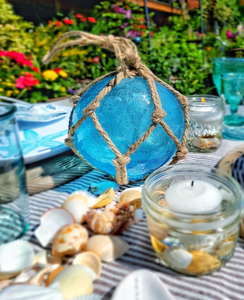blue glass fishing ball with rope for table decor