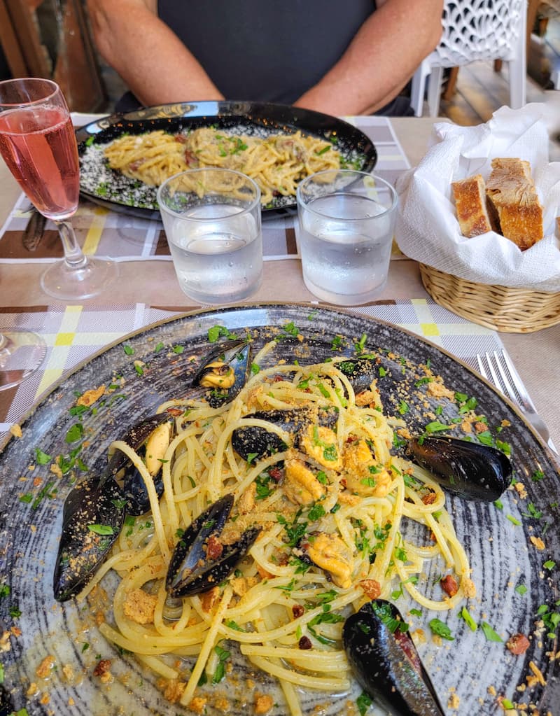 linguini and clams in a restaurant in Naples, Italy - trip to Italy and Greece