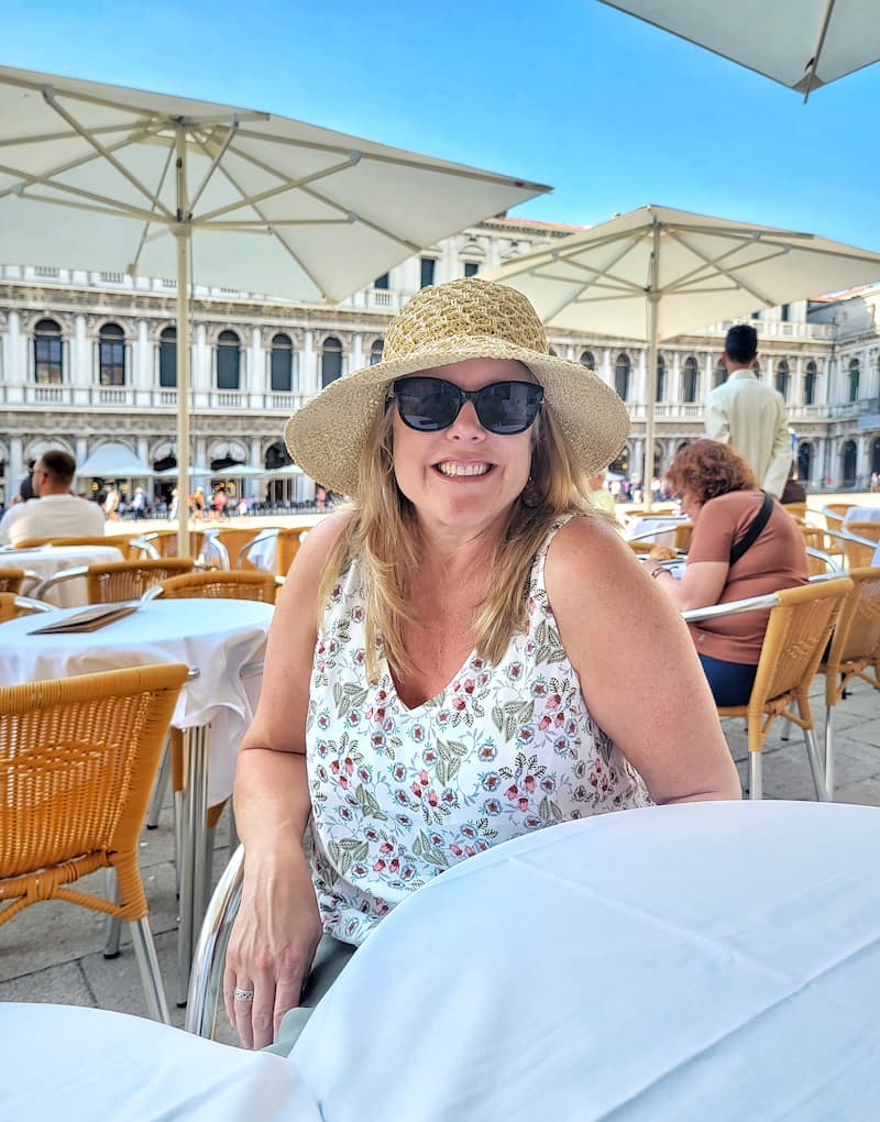 posing at a sidewalk café in Venice, Italy - trip to Italy and Greece