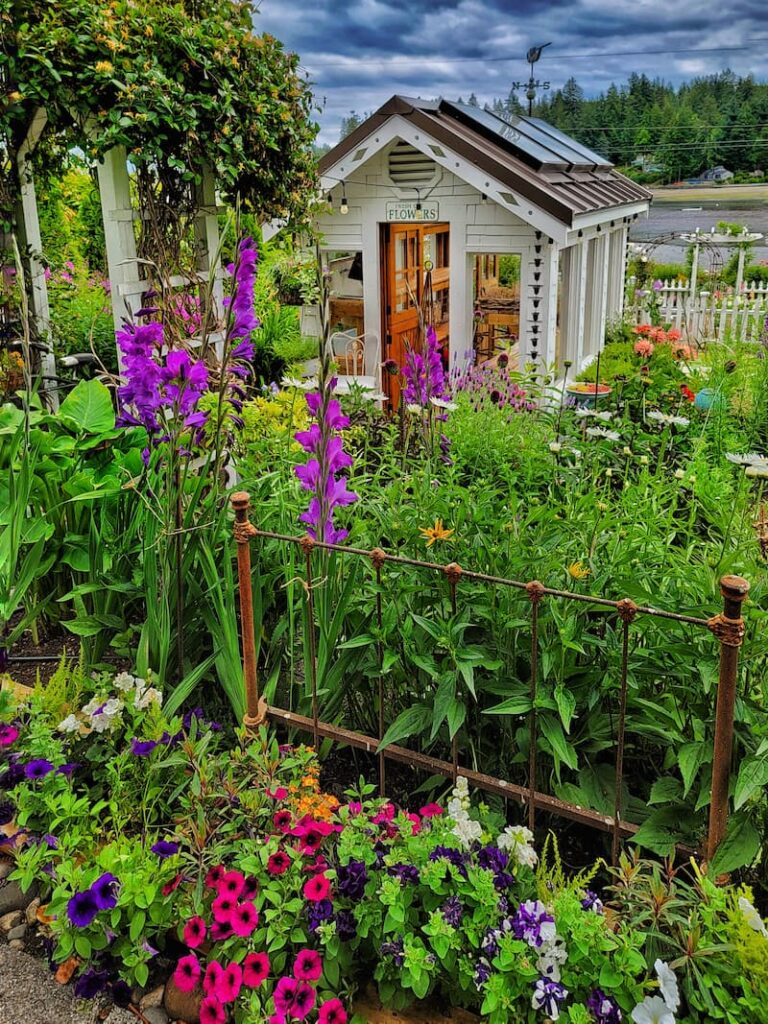 greenhouse garden with vintage headboard