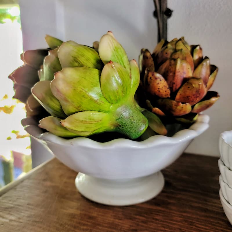 faux artichokes in scalloped vintage ironstone bowl