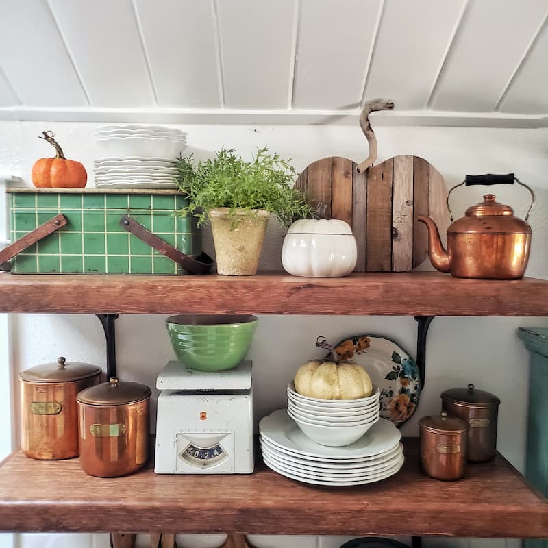 open shelving in the kitchen with vintage pieces displayed