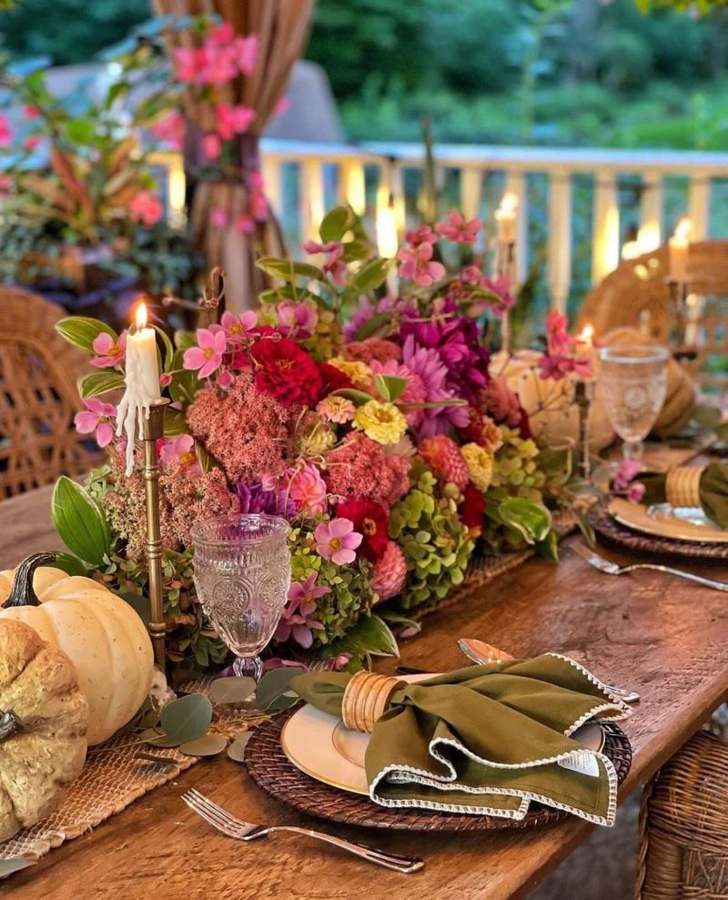cozy fall harvest table with fresh flowers