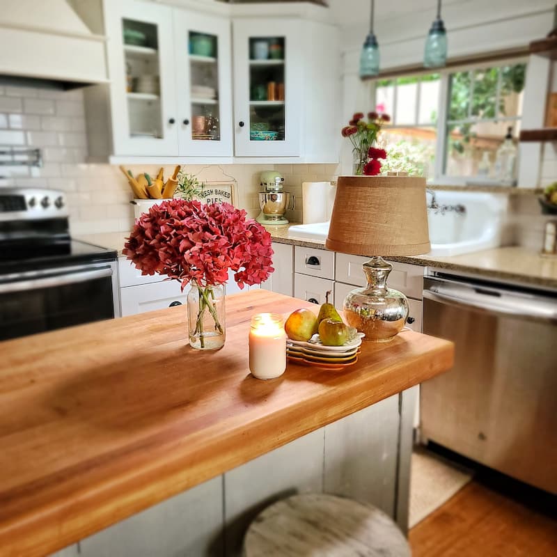 kitchen island with flowers and pears
