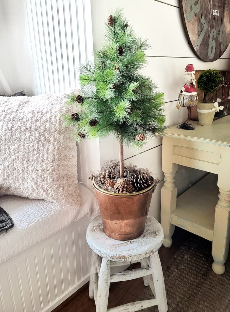 mini Christmas tree with pinecones