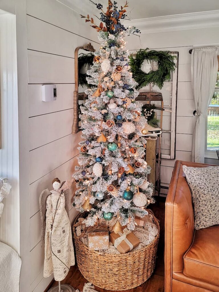 Christmas decor theme: flocked pencil tree decorated for Christmas