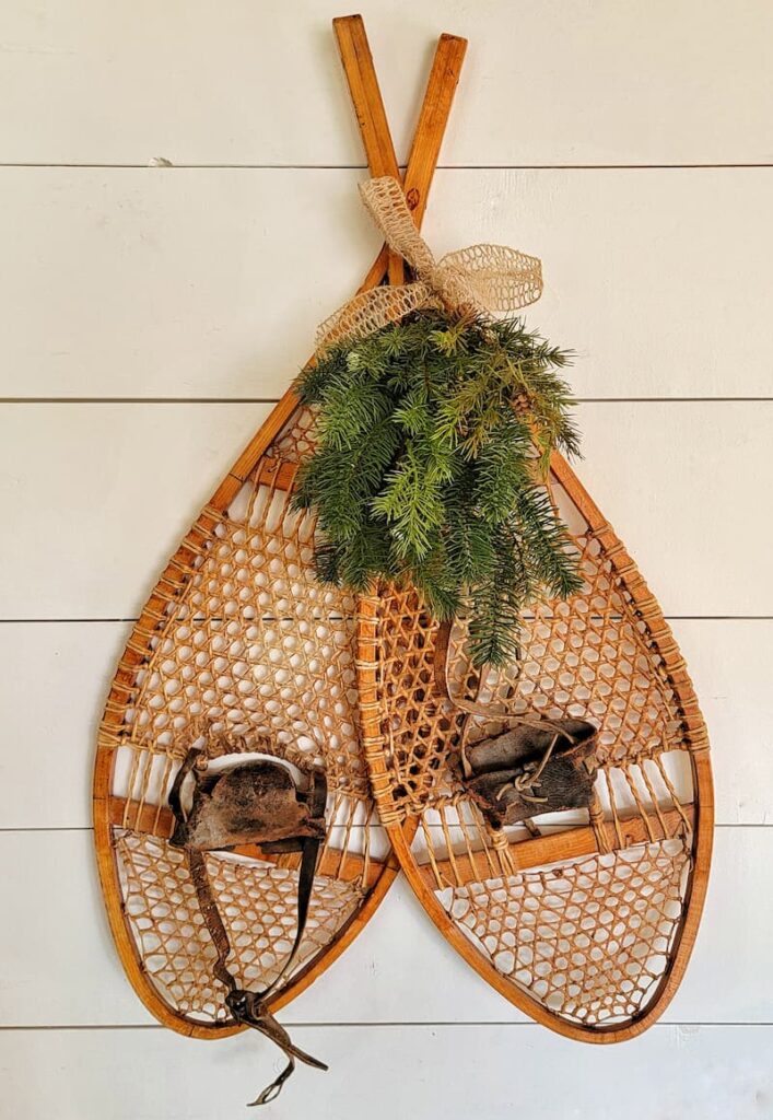 snowshoes with greenery