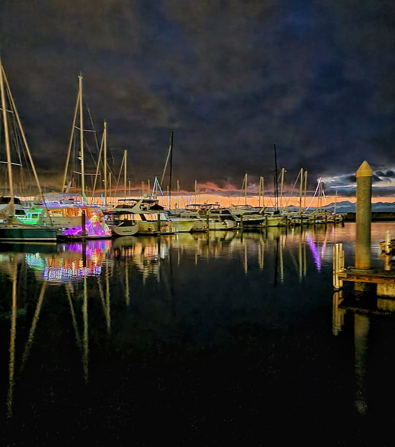 boats at a marina with the evening sky