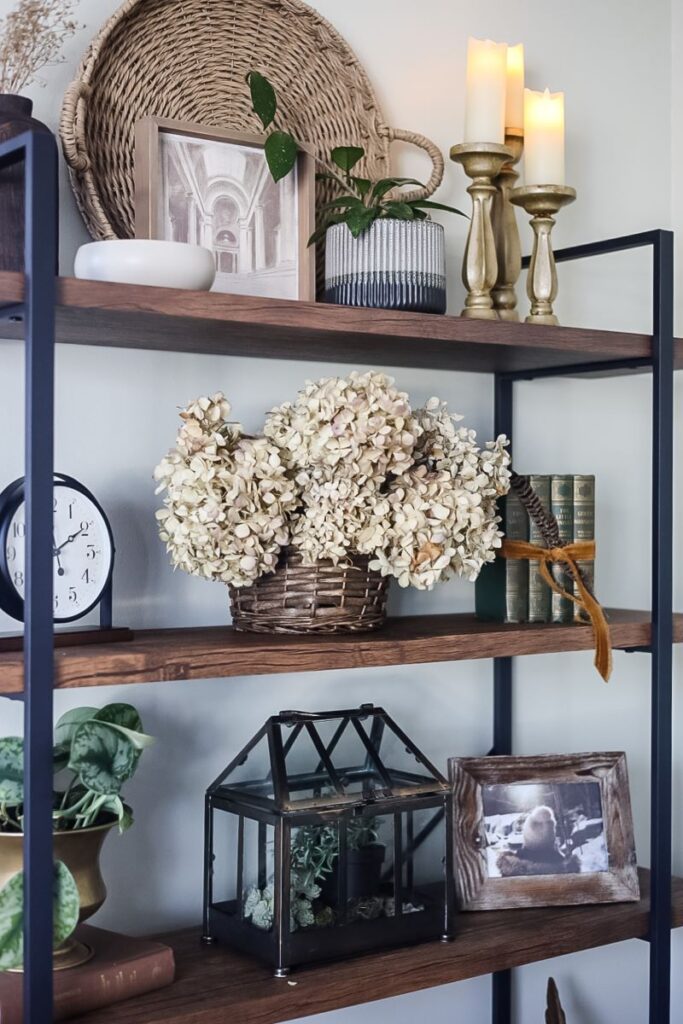 open shelving with vintage pieces